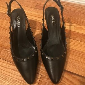 Studded shoes with about 2 1/2 inch heel